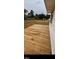 Spacious wooden deck, perfect for outdoor entertaining and relaxation at 1602 Fairground Rd, Dunn, NC 28334