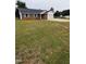 Lovely single-Gathering home featuring a blend of brick and siding with an attached garage at 1602 Fairground Rd, Dunn, NC 28334
