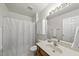 Bathroom with a shower with curtains, and medicine cabinet at 1609 Forest Rd, Wake Forest, NC 27587