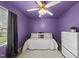 Bedroom featuring ceiling fan, white walls and plush carpet at 1609 Forest Rd, Wake Forest, NC 27587