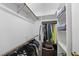 Walk-in closet with shelving and multiple hanging rods for organization at 1609 Forest Rd, Wake Forest, NC 27587