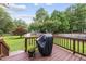 View of deck with a grill and chairs at 1609 Forest Rd, Wake Forest, NC 27587