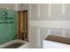 An unfinished bathroom with insulation, plumbing fixtures, and bathtub at 163 Batten Hill Ln, Selma, NC 27576