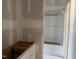 Well-lit bathroom space with a modern tub/shower combo unit at 163 Batten Hill Ln, Selma, NC 27576