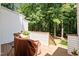 Back deck with outdoor seating with a view of the backyard at 166 Greenmont Ln, Cary, NC 27511