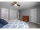 Bedroom featuring walk-in closet and view of a luxurious bathroom at 166 Greenmont Ln, Cary, NC 27511