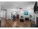 Spacious living room features wood floors and lots of natural light at 166 Greenmont Ln, Cary, NC 27511