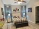 Beautifully decorated bedroom with stylish decor, including a bed with an upholstered headboard and a decorative bench at 1944 Castle Pines Dr, Raleigh, NC 27604