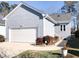Charming single-Gathering home featuring a one car garage, landscaped front yard, and freshly painted exterior at 1944 Castle Pines Dr, Raleigh, NC 27604