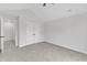 Bright bedroom featuring neutral carpet, vaulted ceiling, and double door closet at 2204 Bellaire Ave, Raleigh, NC 27608