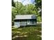 Charming house with spacious back deck overlooking the yard at 225 Meadow Dr, Henderson, NC 27537