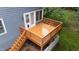 View of wood deck with stairs, railing, and exterior door to home at 2313 Filigree Ct, Raleigh, NC 27614
