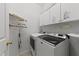 Functional laundry room with modern washer and dryer at 2313 Filigree Ct, Raleigh, NC 27614