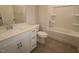 This bathroom features a white vanity with a single sink and a shower/tub combo at 2733 Hunter Woods Dr # 570, Apex, NC 27502