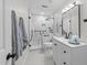 Updated bathroom features walk-in shower with glass door and modern vanity at 2840 Mattlyn Ct, Raleigh, NC 27613