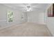 Spacious bedroom featuring neutral walls, comfortable carpet, and ample natural light at 2840 Mattlyn Ct, Raleigh, NC 27613
