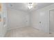 Comfortable bedroom featuring neutral carpet, and a ceiling fan at 2840 Mattlyn Ct, Raleigh, NC 27613