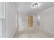 Bright bedroom featuring neutral carpet, a closet, and an open doorway at 2840 Mattlyn Ct, Raleigh, NC 27613
