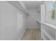 Walk-in closet with built-in shelving providing functional storage solutions at 2840 Mattlyn Ct, Raleigh, NC 27613