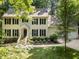 Charming two-story home featuring a well-maintained lawn and classic black shutters at 2840 Mattlyn Ct, Raleigh, NC 27613