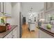 Bright kitchen features stainless appliances, center island, and hardwood floors at 2840 Mattlyn Ct, Raleigh, NC 27613
