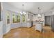 Bright kitchen featuring white cabinets, stainless steel appliances, and a center island at 2840 Mattlyn Ct, Raleigh, NC 27613