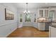 Charming breakfast nook with built-in cabinets and a large bay window overlooking the yard at 2840 Mattlyn Ct, Raleigh, NC 27613