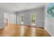 Bright and open living area featuring hardwood floors and a classic, neutral color palette at 2840 Mattlyn Ct, Raleigh, NC 27613
