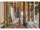Unfinished bathroom showing bare wood studs and new bathtub ready for installation at 310 Wood St, Gibsonville, NC 27249