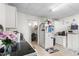 Functional kitchen offering plenty of storage with white cabinetry and essential appliances at 310 Wood St, Gibsonville, NC 27249