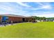 Large backyard with well-kept lawn, landscaping, perfect for outdoor activities and relaxation at 3187 Wilsons Mills Rd, Smithfield, NC 27577