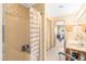 Bathroom featuring a shower, vanity, and neutral wallpaper at 3187 Wilsons Mills Rd, Smithfield, NC 27577
