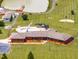 Lovely home with inviting pool and patio area surrounded by well-maintained lawn at 3187 Wilsons Mills Rd, Smithfield, NC 27577