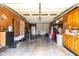 Inside the garage with storage cabinets and utility equipment, offering functional space at 3187 Wilsons Mills Rd, Smithfield, NC 27577