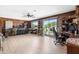 Entertaining space with bar area, a ceiling fan, and sliding glass doors to the outside at 3187 Wilsons Mills Rd, Smithfield, NC 27577
