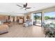 Open-concept living room with hardwood floors and plenty of natural light at 3187 Wilsons Mills Rd, Smithfield, NC 27577