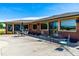 Spacious patio featuring comfortable seating and lush landscaping, perfect for outdoor entertaining at 3187 Wilsons Mills Rd, Smithfield, NC 27577