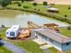 Scenic view of a camper parked near a pond with a gazebo and wooden dock at 3187 Wilsons Mills Rd, Smithfield, NC 27577