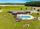 Aerial view of a single-Gathering home featuring an in-ground pool, large yard and beautiful landscaping at 3187 Wilsons Mills Rd, Smithfield, NC 27577
