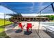 Shaded seating near the pool and patio offers a tranquil outdoor retreat at 3187 Wilsons Mills Rd, Smithfield, NC 27577