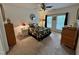 Spacious bedroom with large windows, ceiling fan, and classic decor at 364 Bayleigh Ct, Garner, NC 27529
