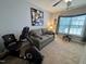 Versatile room offers comfortable seating, exercise equipment and ample natural light at 364 Bayleigh Ct, Garner, NC 27529