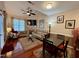 Inviting living room boasts hardwood floors, a fireplace, and plenty of natural light at 364 Bayleigh Ct, Garner, NC 27529