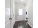 Bright entryway with hardwood floors and a practical mudroom area at 389 Whetstone Dr, Angier, NC 27501