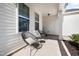 Inviting front porch with comfortable seating perfect for relaxing outdoors at 389 Whetstone Dr, Angier, NC 27501