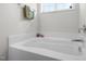 Close-up of a large soaking tub, perfect for relaxation at 389 Whetstone Dr, Angier, NC 27501