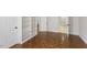 Large bedroom featuring a built-in bookcase and access to an en-suite bathroom at 411 Brampton Close, Pittsboro, NC 27312