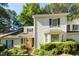 Charming two-story home with a landscaped front yard and inviting entryway at 411 Brampton Close, Pittsboro, NC 27312