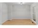 Empty room featuring hardwood floors and a window at 411 Brampton Close, Pittsboro, NC 27312