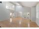 Spacious living room with hardwood floors and a view of the entry at 411 Brampton Close, Pittsboro, NC 27312